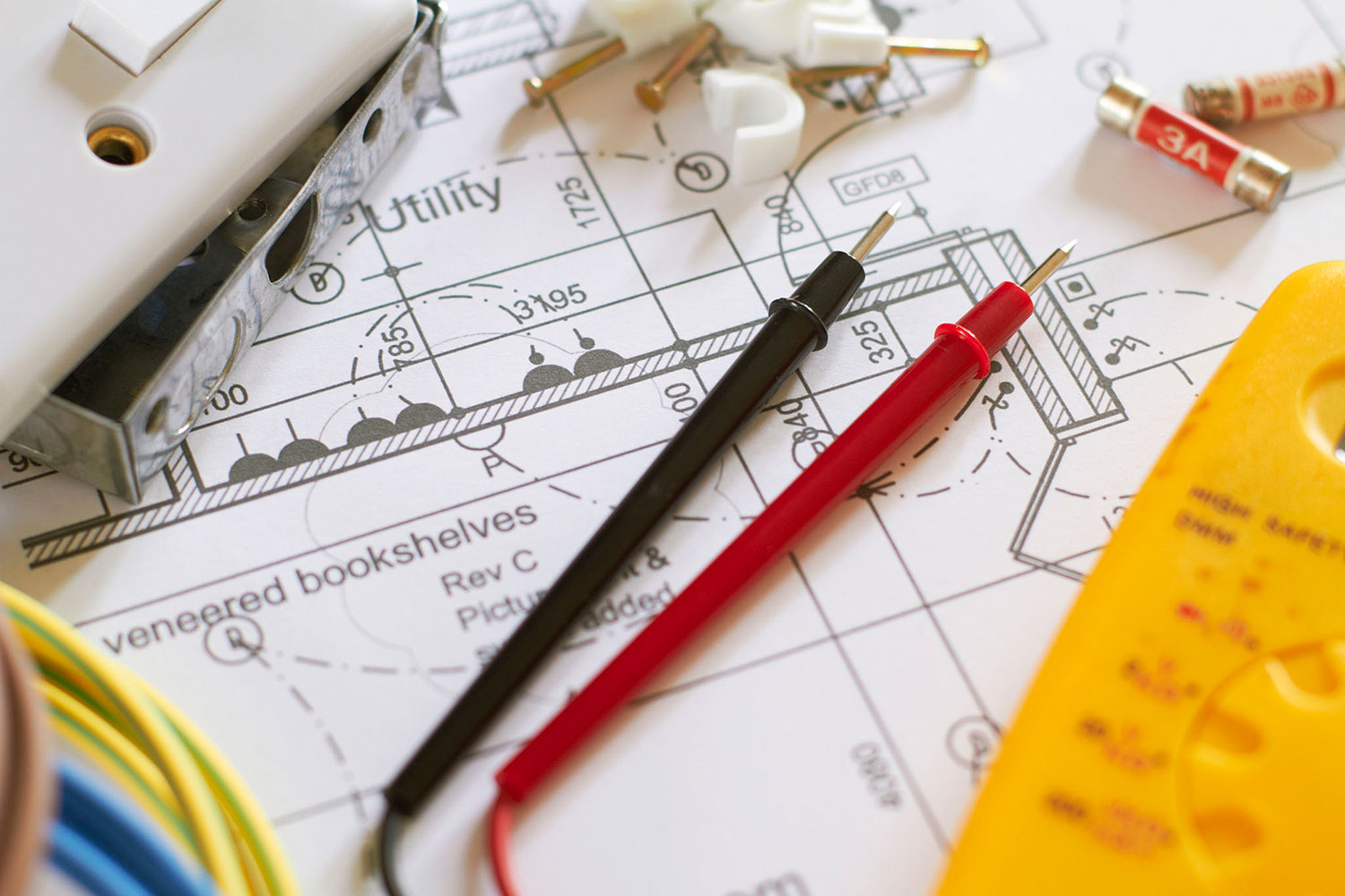 Still Life Of Electrical Components Arranged On Plans (iStock_000021581041)